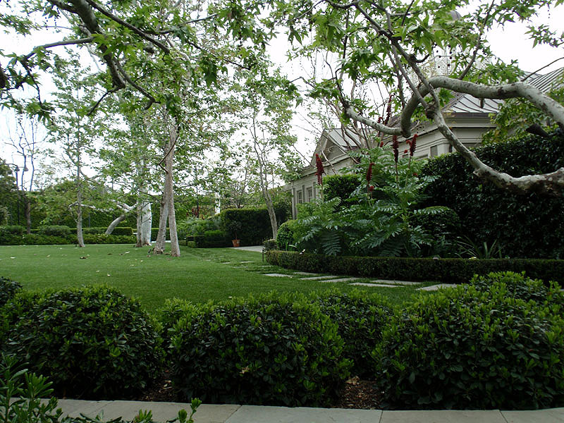Expansive estate lawn with mature trees